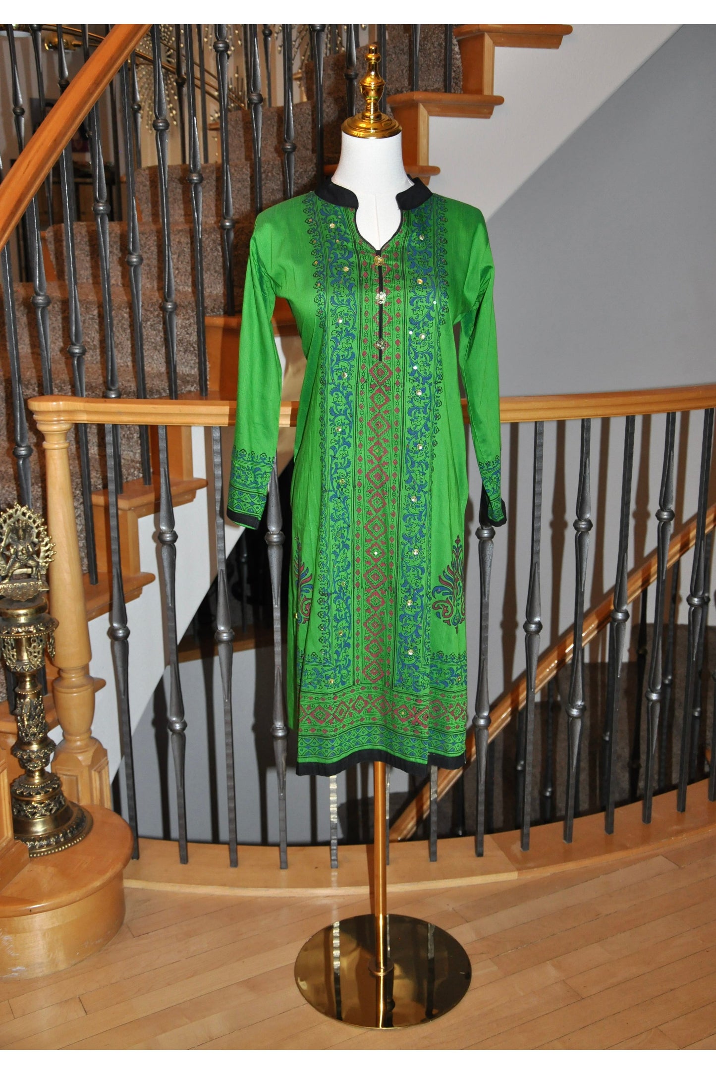 Green Kurti with Blue & Red Accents and Black Border Collar