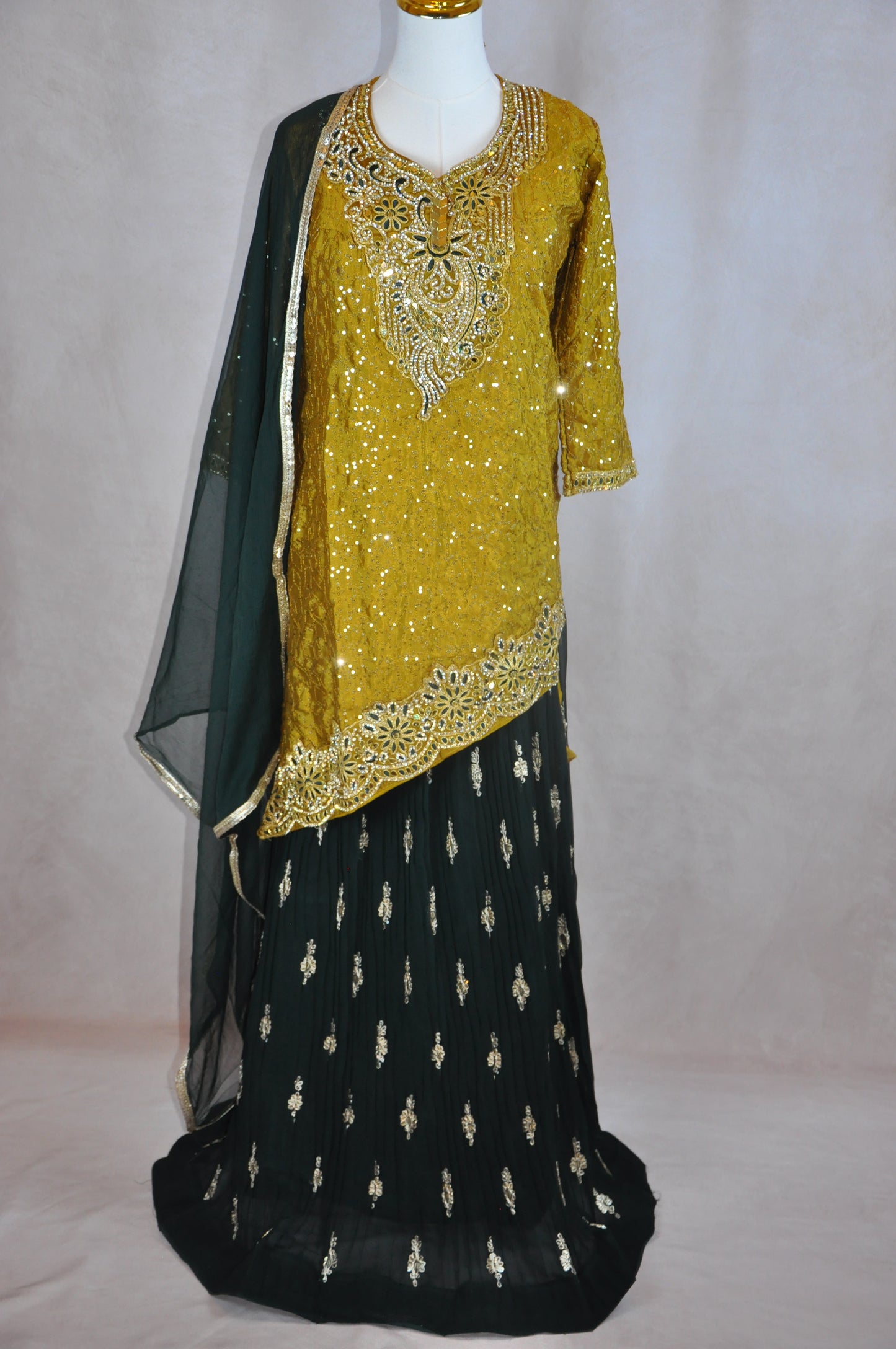 Mustard Yellow Asymmetrical Kurta with Flow Skirt Lehenga & Thin Shawl