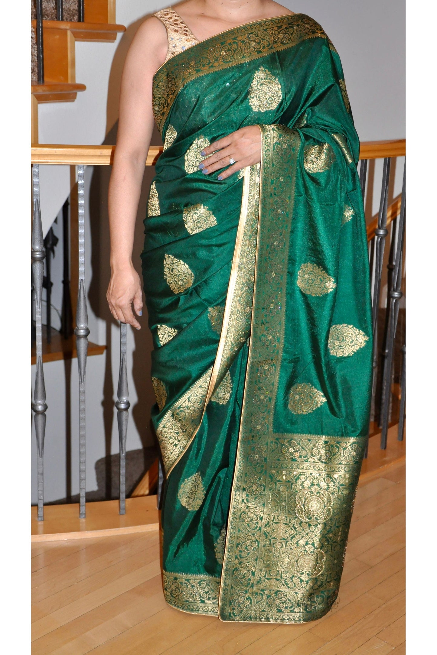 Dark Green Saree with Gold Print & Elegant Border Detailing