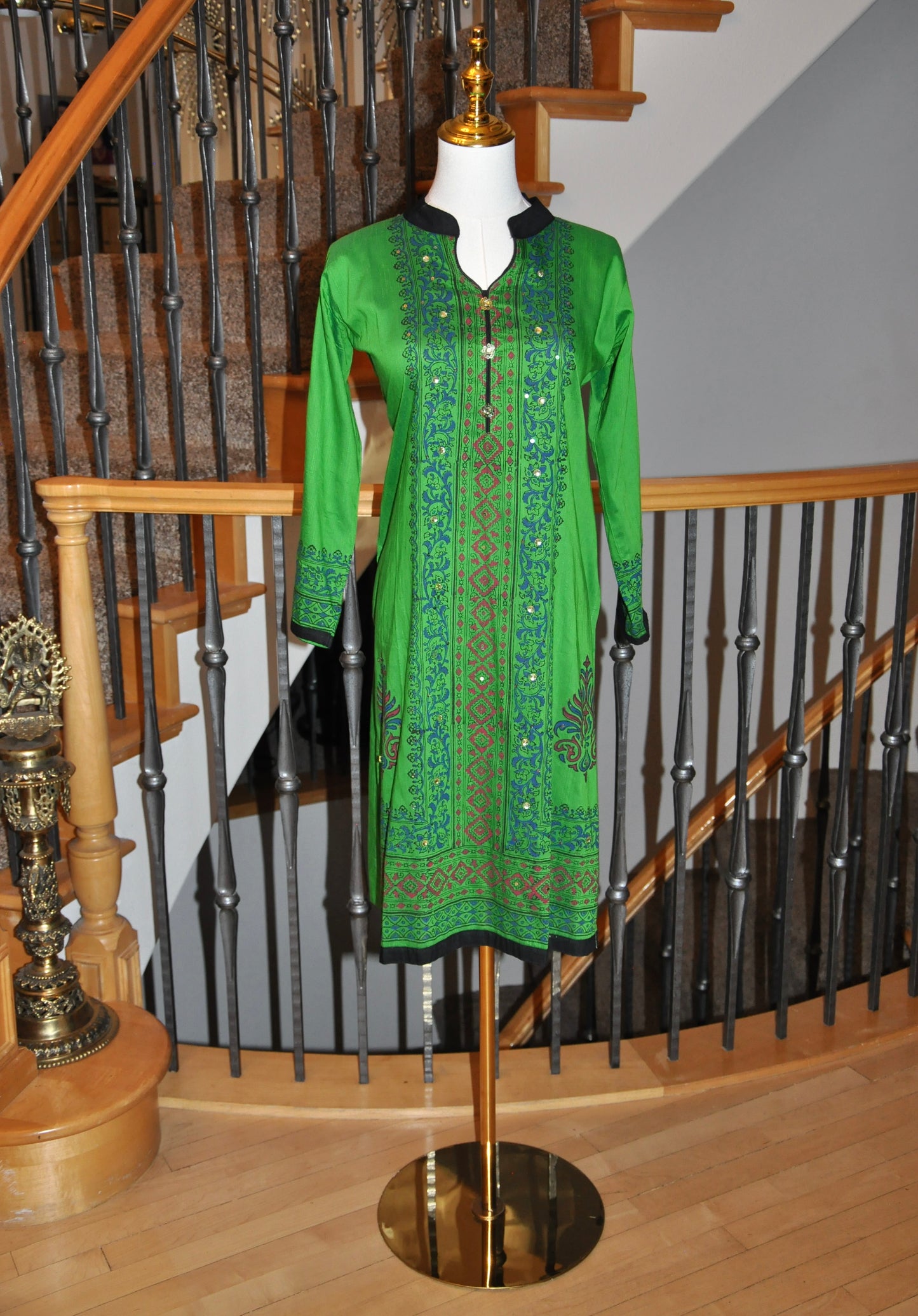 Green Kurti with Blue & Red Accents and Black Border Collar