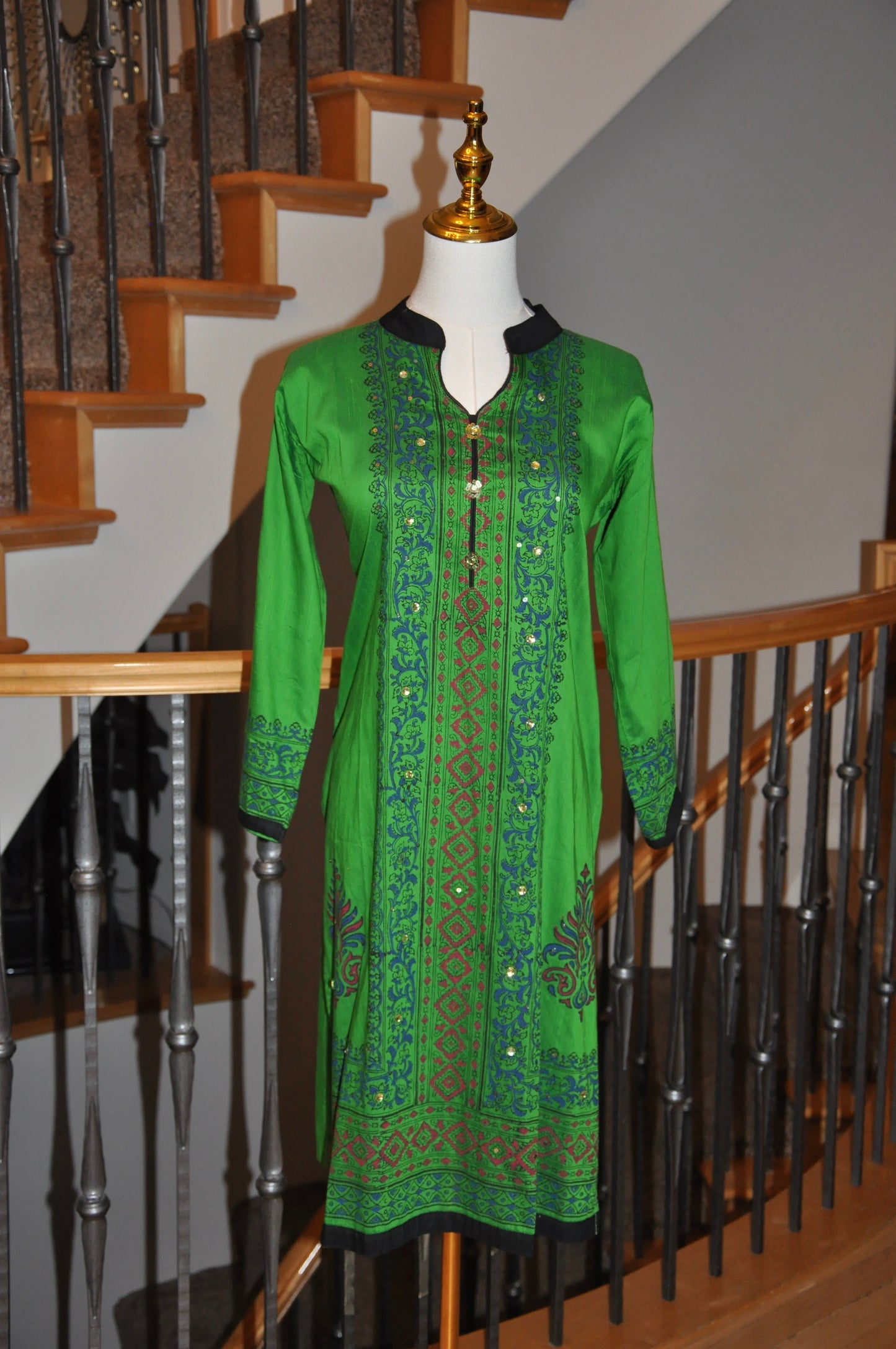 Green Kurti with Blue & Red Accents and Black Border Collar