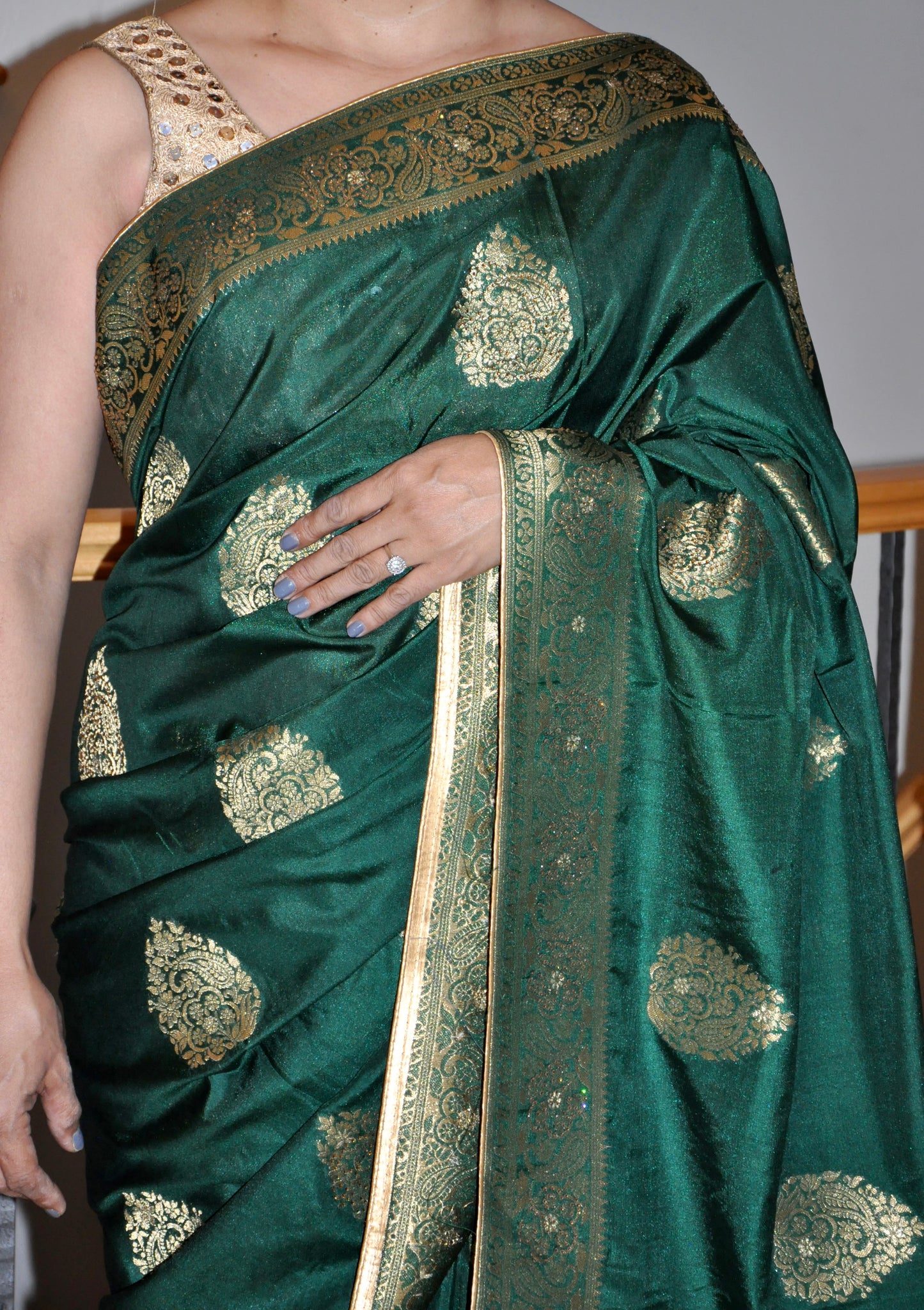 Dark Green Saree with Gold Print & Elegant Border Detailing