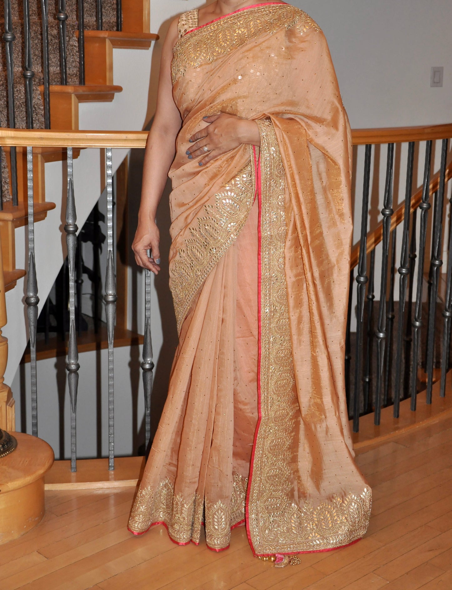 Light Peach Saree with Gold Print Border & Hot Pink Accent